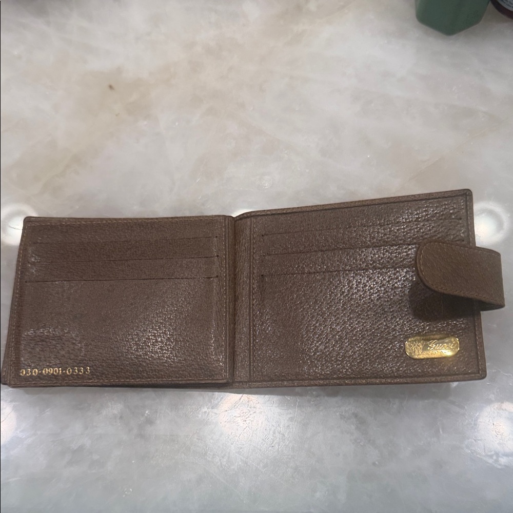 Vintage Authentic Gucci Brown Leather Wallet with Gold Accent